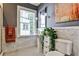 Elegant bathroom with pedestal sink, stylish fixtures, and a marble tiled floor at 2639 Acorn Ne Ave, Atlanta, GA 30305