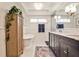 Bright bathroom with a soaking tub, dual sink vanity, and stylish fixtures at 2639 Acorn Ne Ave, Atlanta, GA 30305