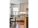 Kitchen nook featuring built-in bench seating, stylish decor, and custom cabinetry at 2639 Acorn Ne Ave, Atlanta, GA 30305