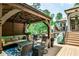 Spacious deck with covered outdoor living space, perfect for entertaining and relaxing at 2639 Acorn Ne Ave, Atlanta, GA 30305