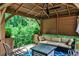 Cozy outdoor living space with comfortable seating and wooded view for relaxation at 2639 Acorn Ne Ave, Atlanta, GA 30305