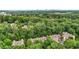 Expansive view of lush trees with townhomes nestled among them, with city skyline in the distance at 5439 Alanis Se Pl # 17, Mableton, GA 30126