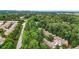 Scenic aerial view of townhomes nestled among lush greenery near a major roadway at 5439 Alanis Se Pl # 17, Mableton, GA 30126