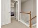 Bright upper hallway features white trim and doors, and neutral paint at 5439 Alanis Se Pl # 17, Mableton, GA 30126