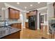 Spacious kitchen featuring wood floors, granite counters, and stainless steel appliances at 5439 Alanis Se Pl # 17, Mableton, GA 30126