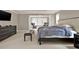 Spacious main bedroom with a sitting area, neutral walls, and carpeted floors at 5439 Alanis Se Pl # 17, Mableton, GA 30126