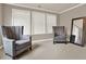 Sitting room with neutral walls, carpeted floors, and lots of natural light at 5439 Alanis Se Pl # 17, Mableton, GA 30126