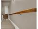 Carpeted stairway with wood railing at 5439 Alanis Se Pl # 17, Mableton, GA 30126