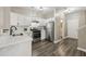 Modern kitchen featuring stainless steel appliances, white cabinetry, and a functional layout at 7077 Biltmore Trce, Lithonia, GA 30058