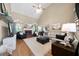 Spacious living room with high ceilings, fireplace, hardwood floors and abundant natural light at 7251 Bluewater Ln, Douglasville, GA 30135