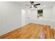 Cozy bedroom with hardwood floors, neutral walls and natural light at 2155 Venetian Sw Dr, Atlanta, GA 30311