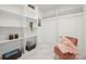 Walk-in closet with shelves and room for storage at 2155 Venetian Sw Dr, Atlanta, GA 30311