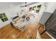 Open floor plan living room with high ceilings, fireplace, and large windows, offering plenty of natural light at 2155 Venetian Sw Dr, Atlanta, GA 30311