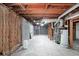 Unfinished basement space featuring concrete floors and exposed ceiling, ready for customization to your needs at 295 Lakemont Dr, Roswell, GA 30075