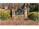 Welcome to Lakemont, a wonderful community with a beautifully designed stone entrance sign at 295 Lakemont Dr, Roswell, GA 30075