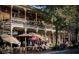 Charming multi-story restaurant with outdoor patio seating and upper level balconies in the downtown area at 295 Lakemont Dr, Roswell, GA 30075
