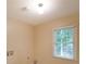Bright room with a window at 295 Lakemont Dr, Roswell, GA 30075