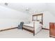 Bright bedroom featuring carpet, ceiling fan, and a classic wood trim at 529 Arnold Rd, Lawrenceville, GA 30044
