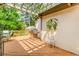 Deck with outdoor dining under pergola, grill, and well-maintained exterior at 529 Arnold Rd, Lawrenceville, GA 30044