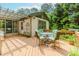 Well-appointed deck features dining, pergola, and access to the backyard at 529 Arnold Rd, Lawrenceville, GA 30044