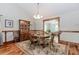 Elegant dining room with hardwood floors, classic decor, and great natural light at 529 Arnold Rd, Lawrenceville, GA 30044