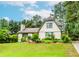 Charming two-story home with well-manicured lawn, beautiful landscaping, and mature trees at 529 Arnold Rd, Lawrenceville, GA 30044