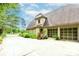 Side view of this charming home with a large driveway and a two-car garage at 529 Arnold Rd, Lawrenceville, GA 30044