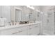 Spacious bathroom with double vanity, modern fixtures and glass-enclosed shower at 687 Banton Nw Dr, Atlanta, GA 30318