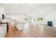 Spacious open-plan living and kitchen area with modern finishes and natural light at 1411 Stephens View Dr, Loganville, GA 30052