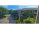 Scenic exterior shot shows building surrounded by lush trees and greenery at 2700 Pine Tree Ne Rd # 3009, Atlanta, GA 30324