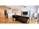 Bright living room featuring modern decor, hardwood floors, and an open floor plan at 2700 Pine Tree Ne Rd # 3009, Atlanta, GA 30324