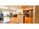 Open concept living and kitchen area with stainless appliances, hardwood floors, and recessed lighting at 2700 Pine Tree Ne Rd # 3009, Atlanta, GA 30324
