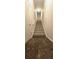 Entryway with tile flooring and carpeted stairs with white handrail at 2700 Pine Tree Ne Rd # 3009, Atlanta, GA 30324