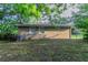 Exterior of home shows brick wall, windows and backyard at 4029 Moffat Ct, Decatur, GA 30035