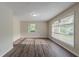 Bright living room with hardwood floors, natural light, and neutral paint at 4029 Moffat Ct, Decatur, GA 30035