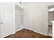 Bright bathroom featuring tiled floors and a standing shower for accessible bathing at 7495 Garnet Dr, Jonesboro, GA 30236