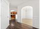 Elegant entryway features arched doorways leading to the kitchen and dining room at 7495 Garnet Dr, Jonesboro, GA 30236