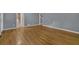 Living room with hardwood floors, and gray walls at 9480 Coleman Rd, Roswell, GA 30075