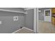 Functional utility room with access to laundry connections and tiled flooring at 9480 Coleman Rd, Roswell, GA 30075