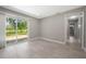 Bedroom with a sliding glass door and light wood-look flooring at 2159 Fairburn Sw Rd, Atlanta, GA 30331