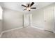 Well lit bedroom featuring luxury vinyl plank flooring and two closets at 2159 Fairburn Sw Rd, Atlanta, GA 30331