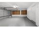 Spacious garage with room for two cars, painted walls and floor, and additional storage space at 2159 Fairburn Sw Rd, Atlanta, GA 30331
