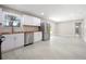 Open kitchen design with stainless steel appliances and ample natural light at 2159 Fairburn Sw Rd, Atlanta, GA 30331