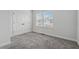 Bedroom featuring double door closet with views from the sunlit window, offering a tranquil space at 2631 Creekside Nw Dr, Atlanta, GA 30318