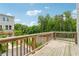 Inviting outdoor deck area perfect for relaxing with a view of lush green trees at 2631 Creekside Nw Dr, Atlanta, GA 30318