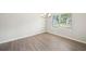Cozy dining area with hardwood floors, neutral walls and a large window at 3633 Squires Park Ln, Loganville, GA 30052