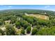 Aerial view of homes within a wooded community at 5383 Biffle Way, Stone Mountain, GA 30088