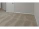 Bedroom featuring neutral-colored walls and carpet at 5383 Biffle Way, Stone Mountain, GA 30088