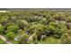 Scenic aerial view of a neighborhood with lush green trees and well-maintained lawns at 204 Morris St, Palmetto, GA 30268