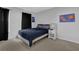 Simple bedroom featuring natural light and carpet flooring at 2530 River Run Dr, Dacula, GA 30019